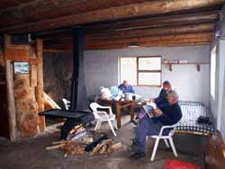 Relaxing inside the Arangieskop hut