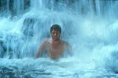 Enjoying a wet season waterfall