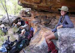 Resting in a rock shelter, photo J Mayze
