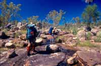 Walking over broken rock near Drysdale River