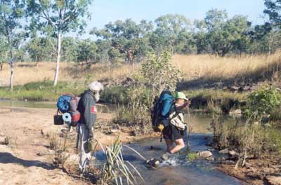 Crossing a creek near the start of the Manyallaluk to Gorge walk